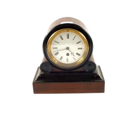 A Walnut and ebonised dome top mantel clock
