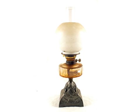 A cut glass iron base oil lamp