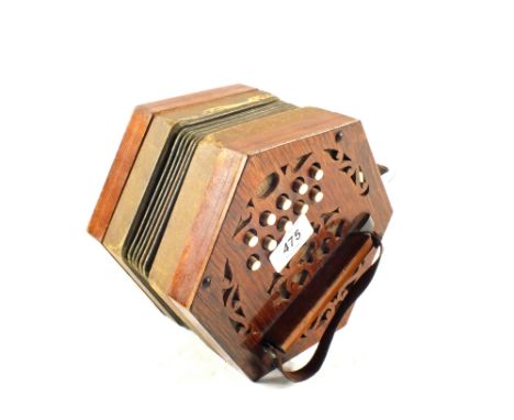 A Rosewood hexagonal accordion 