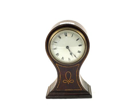 An Edwardian Brass inlaid Mahogany balloon mantel clock