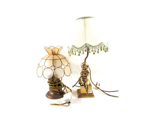 A Brass seated girl table lamp and one other