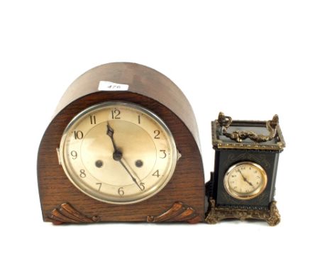An Oak striking mantel clock and one other