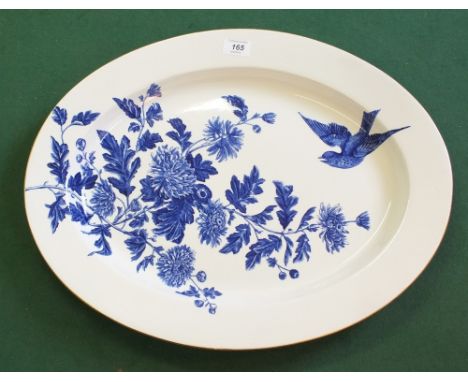 A Royal Worcester oval blue and white floral and bird decorated meat plate