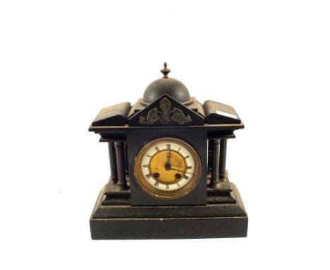 A black slate mantel clock