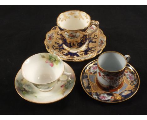 A Spode cup and saucer, Royal Worcester cup and saucer and an English cup and saucer