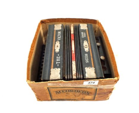 A German Victor accordion in original box