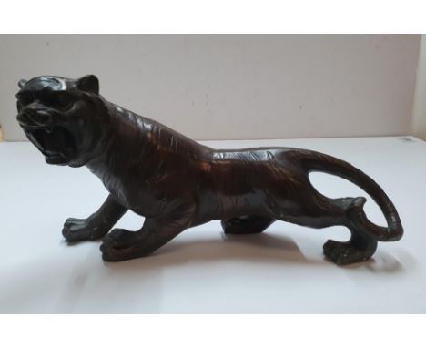 Antique unmarked Chinese bronze tiger,30 cm in length 