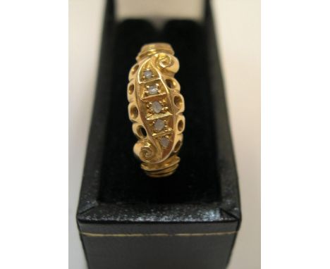 18ct yellow gold, boat shaped ring with 5 square cut diamonds Approx 1.9 grams gross, size J/K