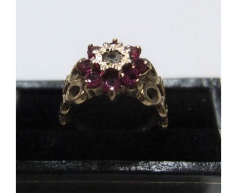 Modernist 9ct yellow gold ruby cluster ring with unusual circular shouldersApprox 3.2 grams gross,           size J 