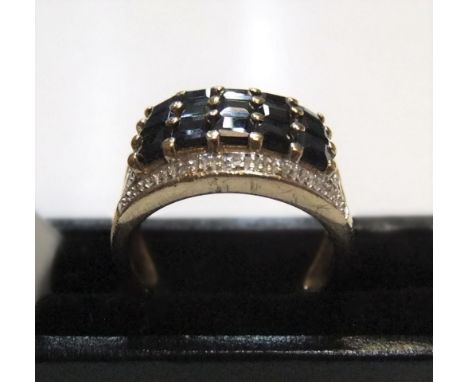 Gents 9ct yellow gold, sapphire 3 row ring Approx 4.9 grams gross,          size L 