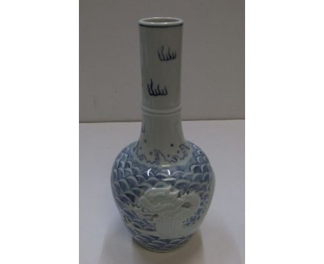 Chinese 20thC single stem, unusual light B&W vase with white dragon decoration, stamped mark to base25 cm high 