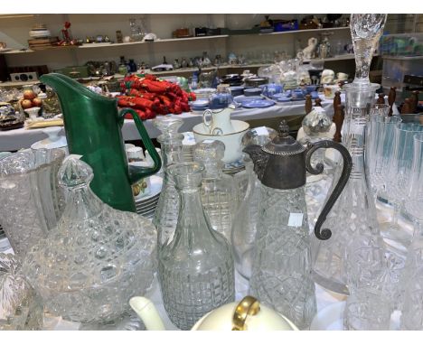 A cut glass conical decanter; other decanters; etc. 