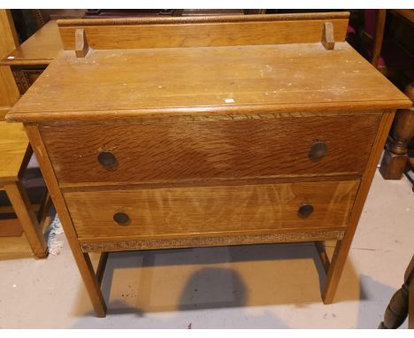 Two 1930's oak 2 height chests of drawers; a bamboo shelf unit 