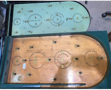 Two early 20th century bagatelle board; a collection late 19th/early 20th century push along-figures on bicycles 