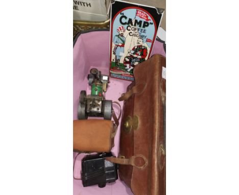 A Mamod steam roller; vintage Coronet box camera; 'Camp Coffee' plaque; brief case 