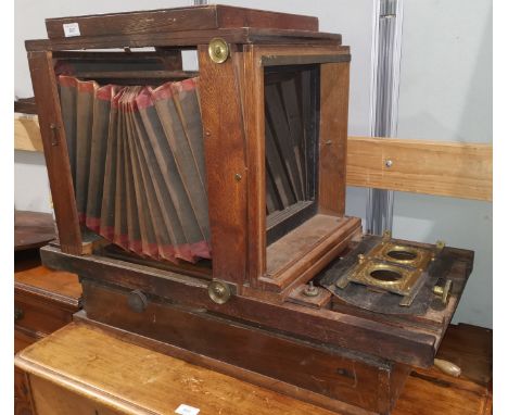 A late 19th / early 20th century large oak framed studio camera Fabricants Brevets 