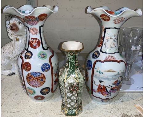 A pair of Japanese ceramic vases with flared rims, hand painted with panels depicting Samurai &amp; Geisha, hand painted sign