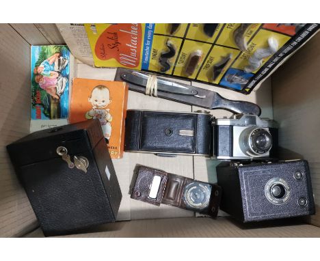 An early Leica light meter; various cameras and collectables 