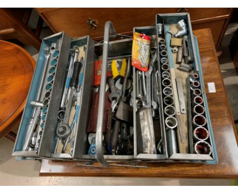A tool box containing engineers tools