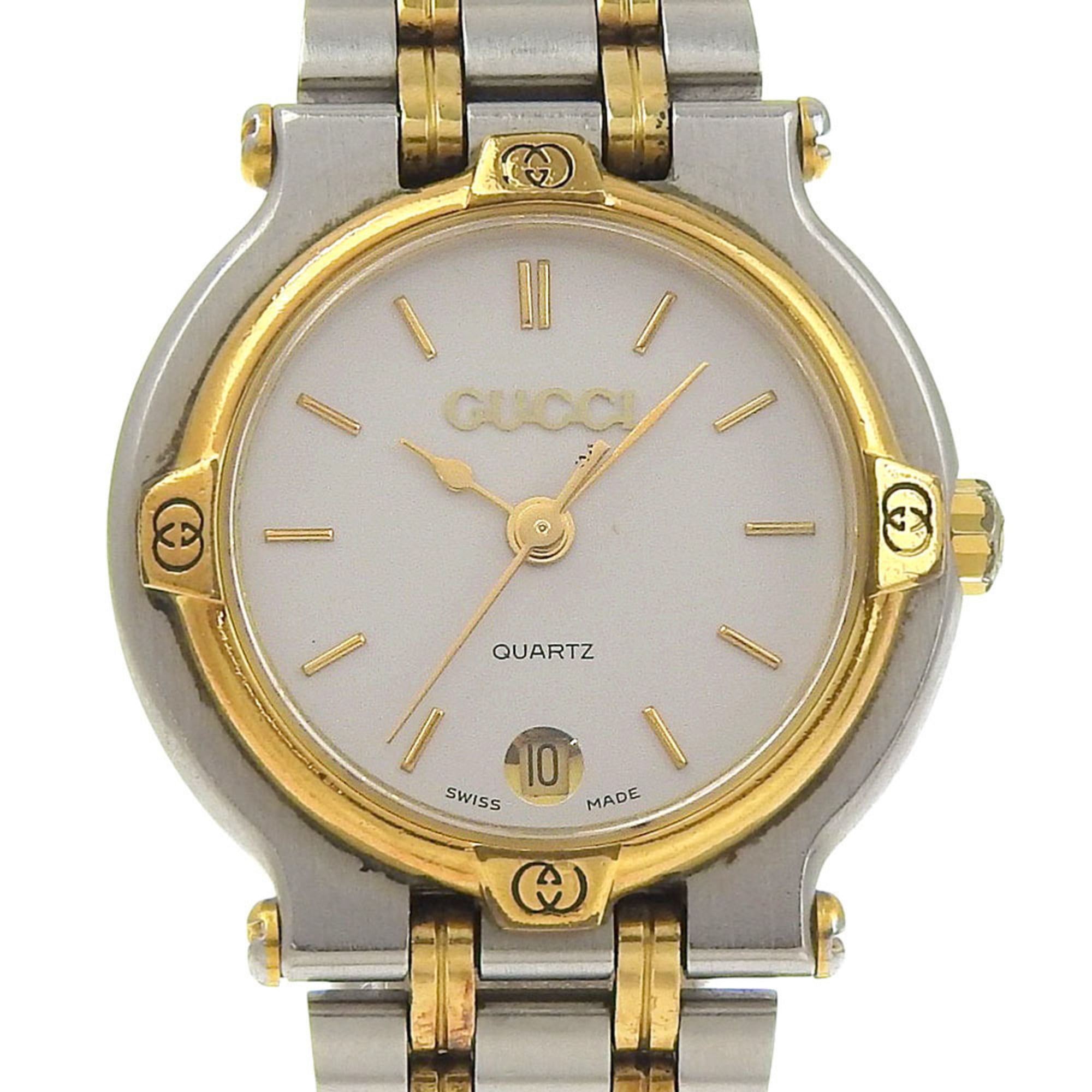 Gucci women's watch, stainless steel, quartz, analog, silver dial.