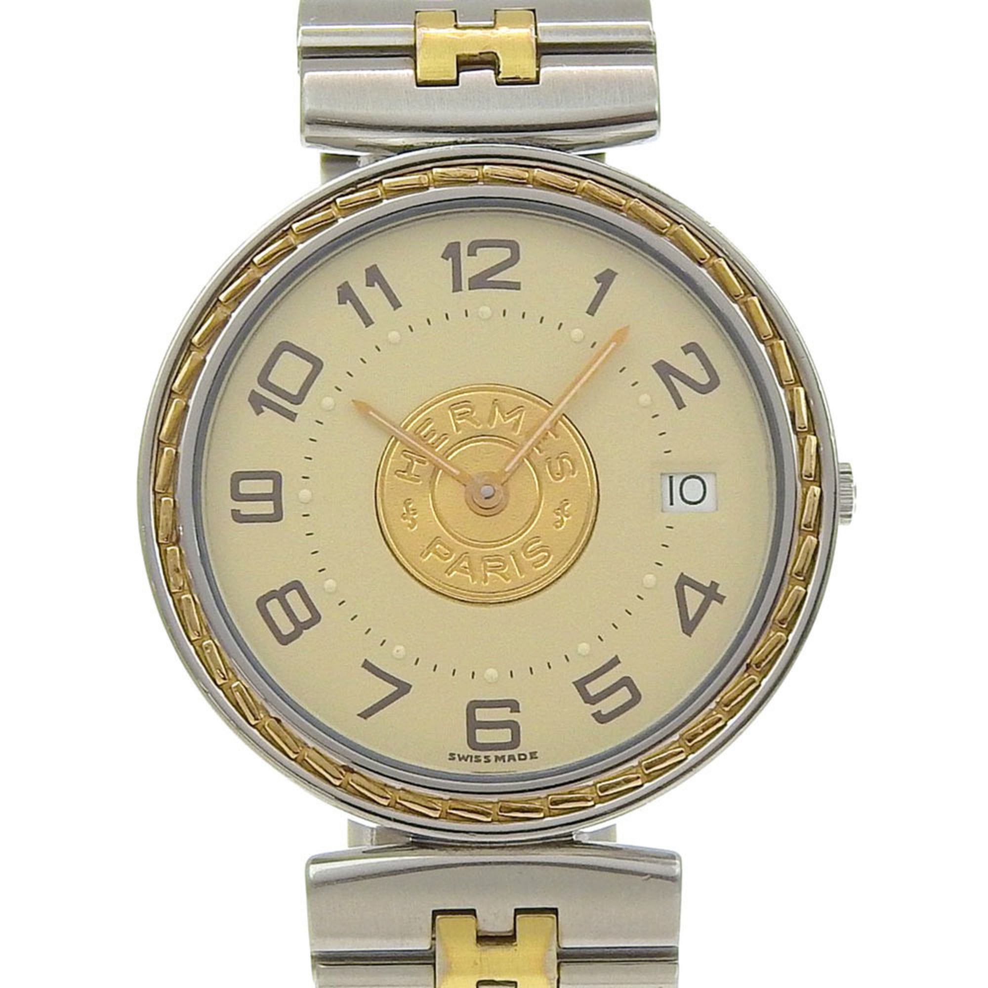 Hermès Serie watch, stainless steel, quartz movement, analog display, ivory dial, unisex