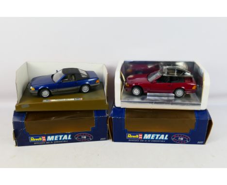 Revel - Two boxed diecast 1:18 scale Revell #8801 Mercedes 500SL Convertibles. Both models appear to be in display dusty cond