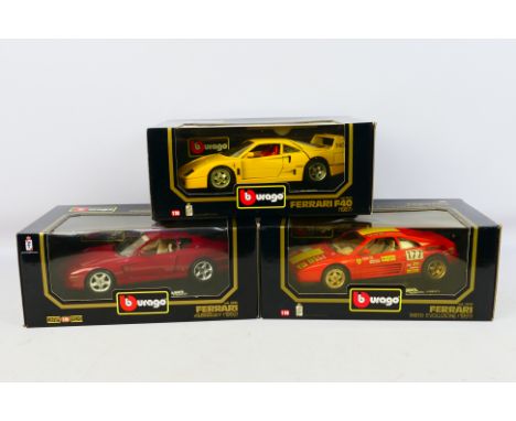 Bburago - Three boxed Bburago 1:18 scale Ferrari diecast model cars. Lot consists of #3022 Ferrari F40;; ~3029 Ferrari Evoluz