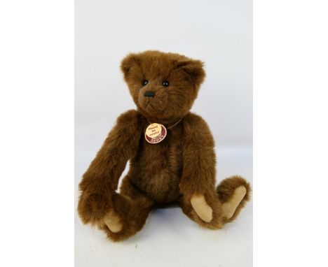 Charlie Bears - A Charlie Bears CB06021 'Georgie' growling bear. The fully jointed bear, stands approximately 38cms in height