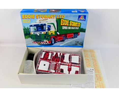 Italeri - A boxed IItaleri #708 1:24 scale 'Eddie Stobart' Truck & Trailer plastic model kit. The kit has loose parts and par