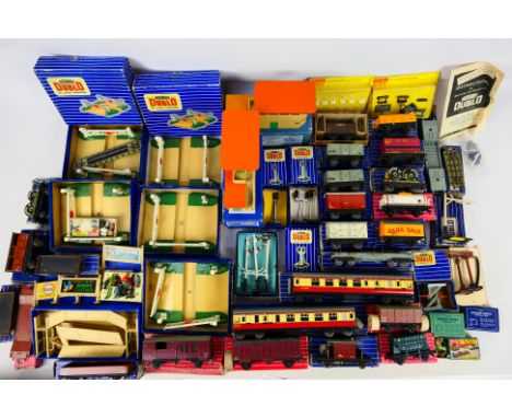 Hornby Dublo - An assortment of approximately 40 vintage OO scale railway items to include 5x D1 Level Crossing, 2x D1 Signal