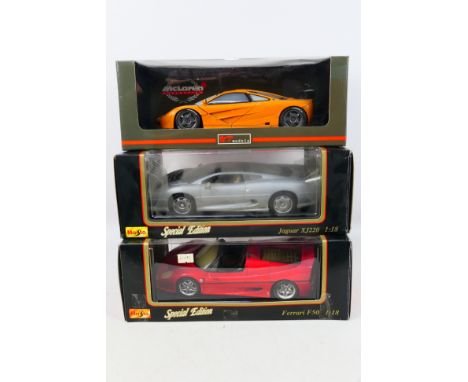 Maisto - UT Models - Three boxed 1:18 scale diecast model cars. Lot consists UT Models  #53015890 McLaren F1 GTRLe Mans Roadc