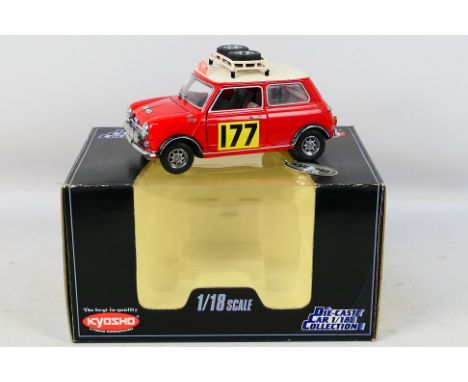 Kyosho - A boxed Kyosho #7012 1:18 scale Morris Mini Cooper 1275S '67 Rally. The model is slightly dusty and has a loose rear