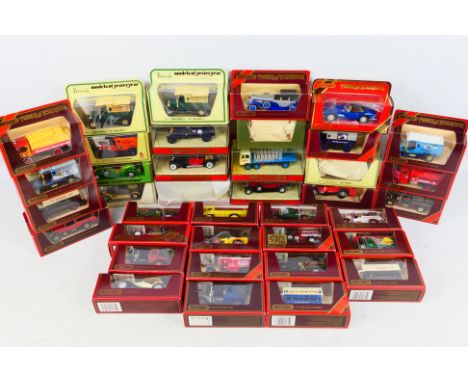 Matchbox - A collection of 38 Models of Yesteryear vehicles to include Y-24 1927 Bugatti T44, Y-18 Cord, Y-14 1931 Stutz Bear
