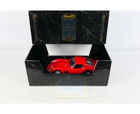 Revell - A boxed diecast 1:12 scale Revell #8850 '64 Ferrari 250 GTO. The large model in iconic red has some light surface ma