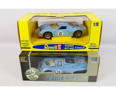 Revell - Universal Hobbies - Two boxed 1:18 scale diecast model cars. Lot consists Revell Ford GT40 Le Mans 1969; with Univer