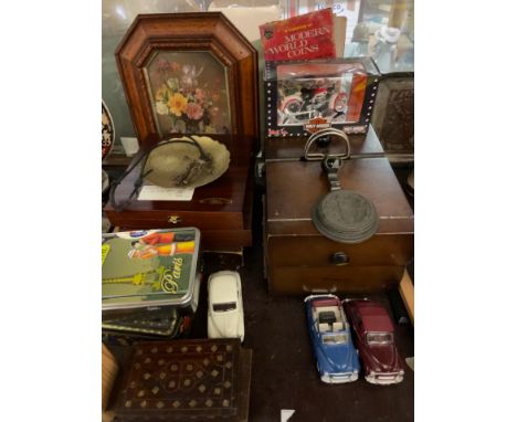 A model Harley Davidson, together with model cars, tins, weights, picture etc
