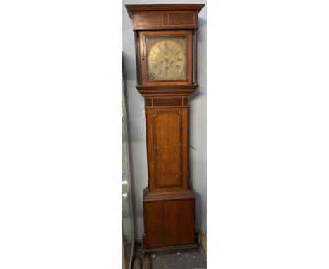 A 19th century oak and mahogany longcase clock, with a moulded cornice and reeded columns above a long trunk door, box base a