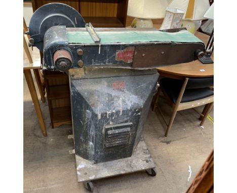 A Junior Whitehead Belt sander, sold as seen, untested (power cable removed) together with sanding belts