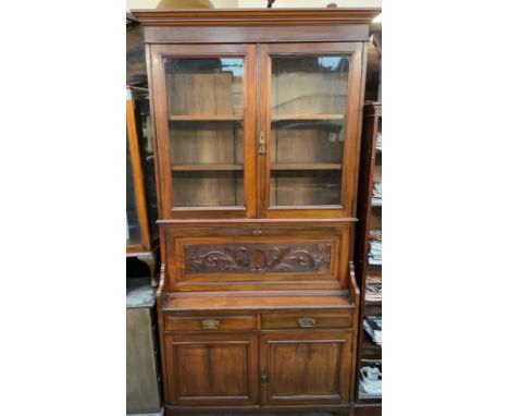 An Edwardian walnut bureau bookcase,  with a moulded cornice above a pair of glazed doors, fall front and fitted interior, th