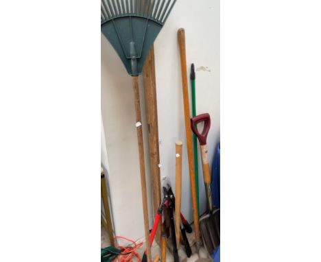 A collection of tools together with lawn mowers etc 