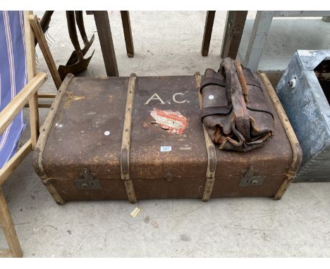 A WOOD BOUND TRAVEL TRUNK AND A VINTAGE LEATHER GLADSTONE BAG 