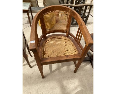 A MAHOGANY ARMCHAIR WITH RATTAN SEAT AND BACK 