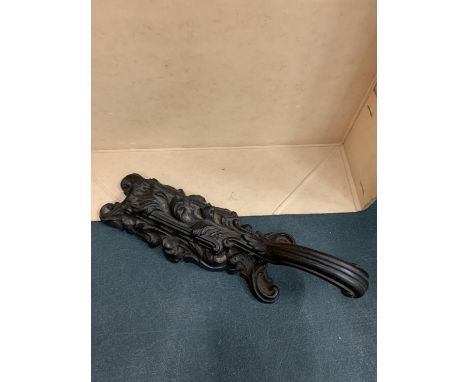 A CAST IRON KNOCKER 