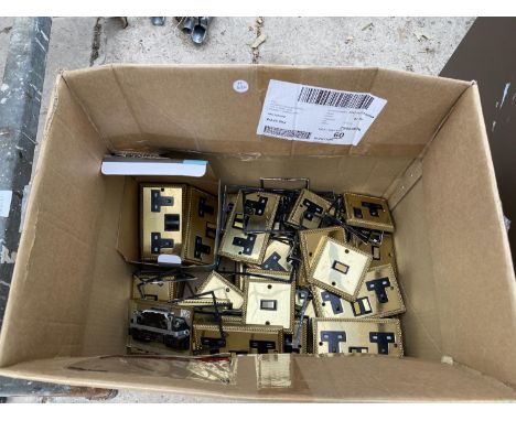 A BOX OF BRASS COLOURED SOCKETA AND LIGHT SWITCHES 