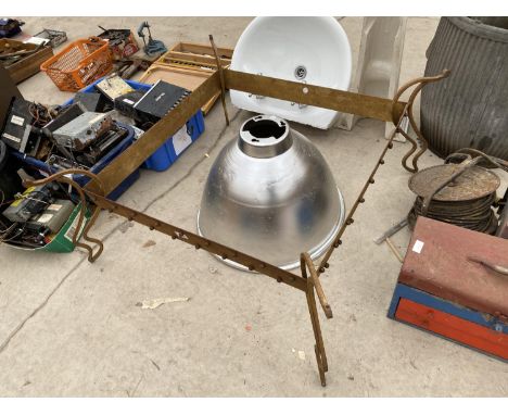 A VINTAGE METAL TABLE BASE AND AN ALUMINIUM INDUSTRIAL LIGHT SHADE 