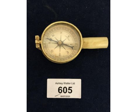 A VINTAGE COMPASS 