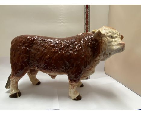 A LARGE BUTCHER'S SHOP CERAMIC HEREFORD BULL 