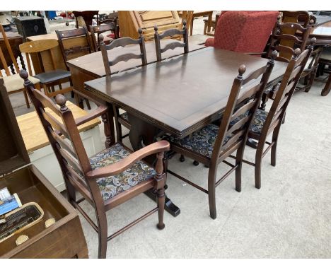 AN ERCOL OAK DRAW LEAF DINING TABLE WITH FOUR LADDER BACK DINING CHAIRS AND TWO CARVERS 