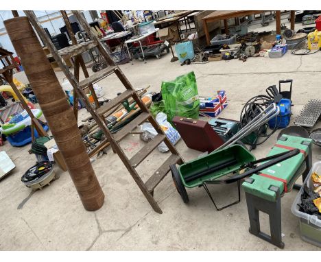A VINTAGE SEVEN RUNG WOODEN STEP LADDER, A GARDEN KN EELER, GARDEN SPREADER AND A ROLL OF LINO 