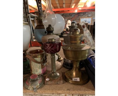 A QUANTITY OF BRASS LAMPS AND LAMP PARTS 
